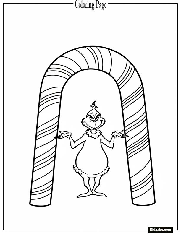 The Grinch standing in front of a giant candy cane