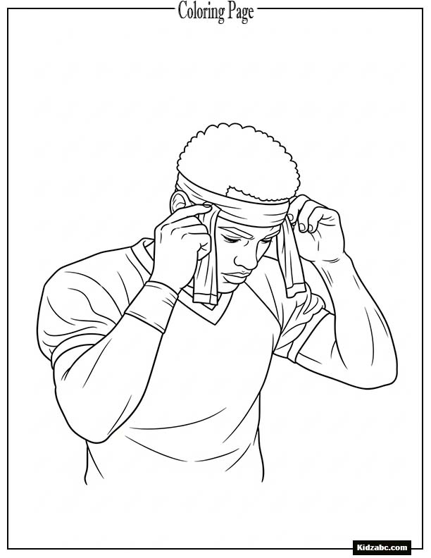 Footballer tying headband